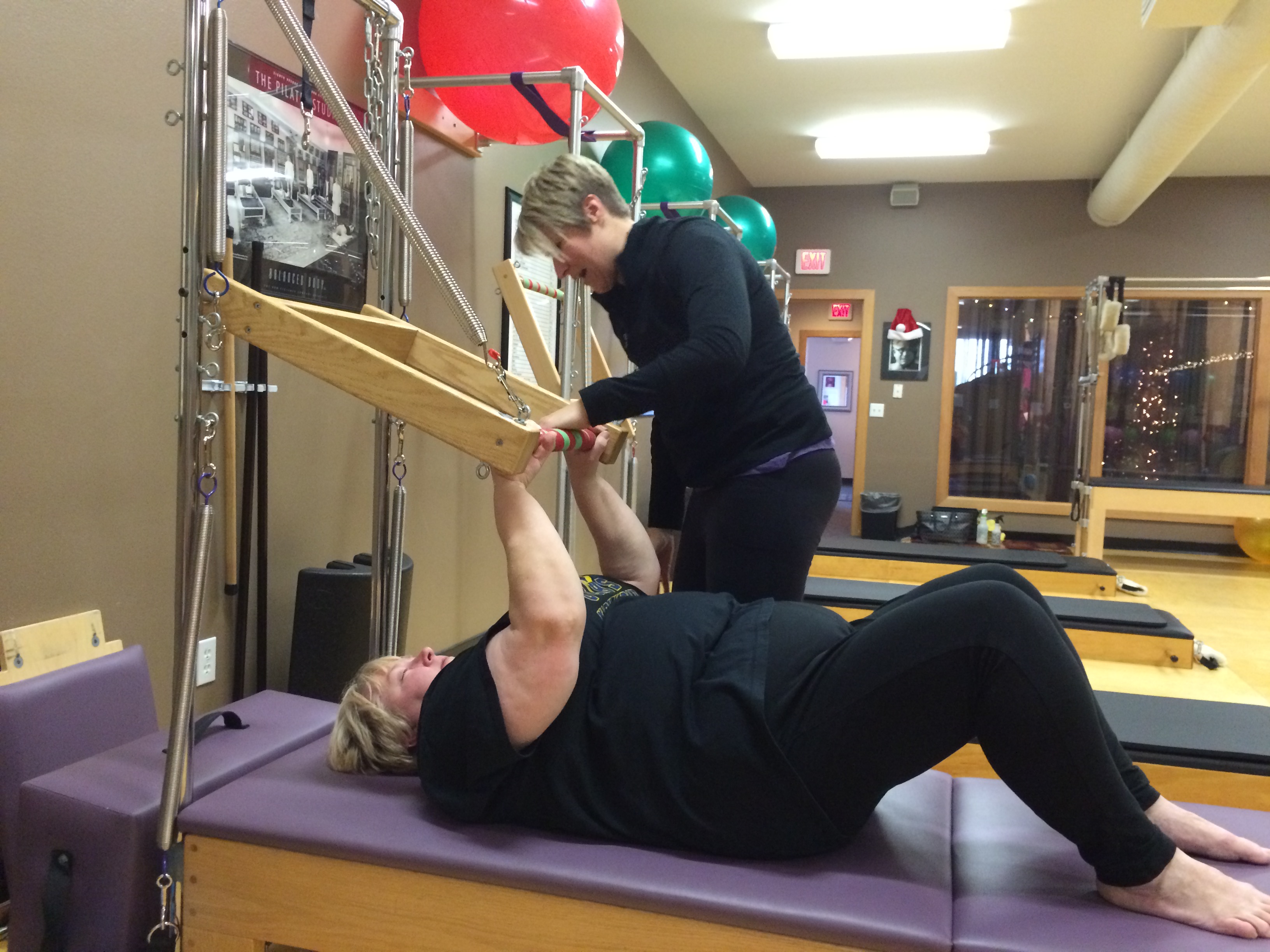 picture of Diane using the Pilates Tower
